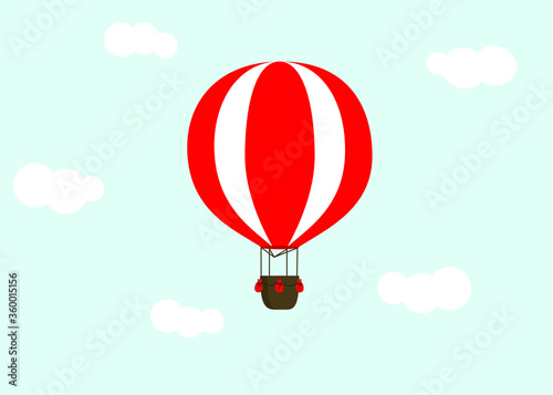 Red hot air balloon with clouds