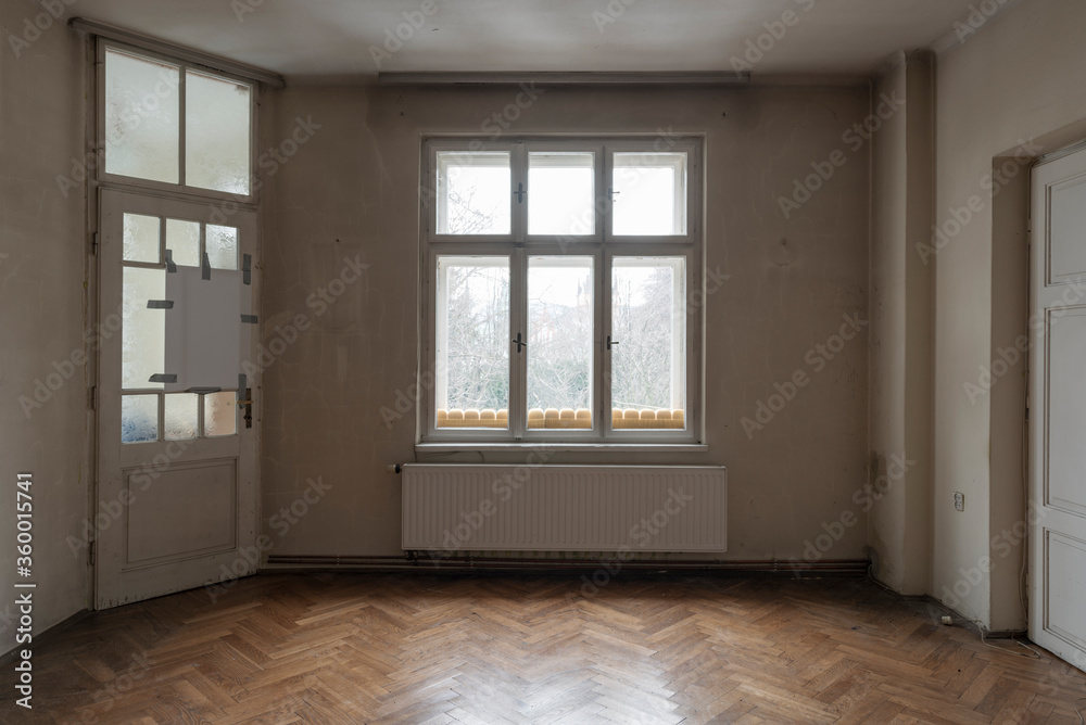 Perpendicular view huge window and two doors in antique house Perpendicular view huge window and two doors in antique house
