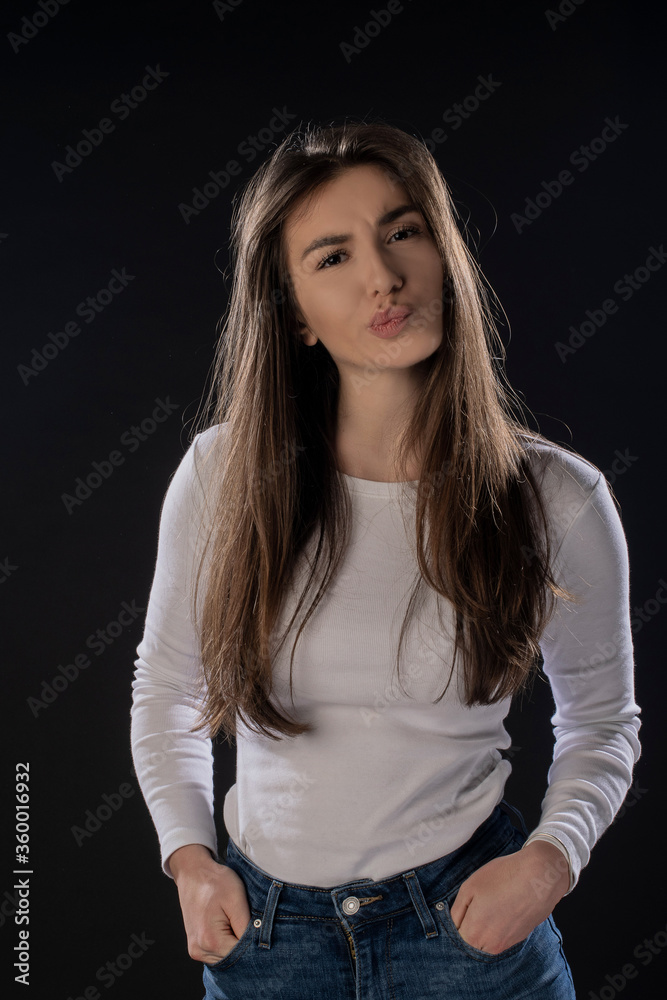 Girl posing on black background. Isolated Girl posing on black background. Isolated