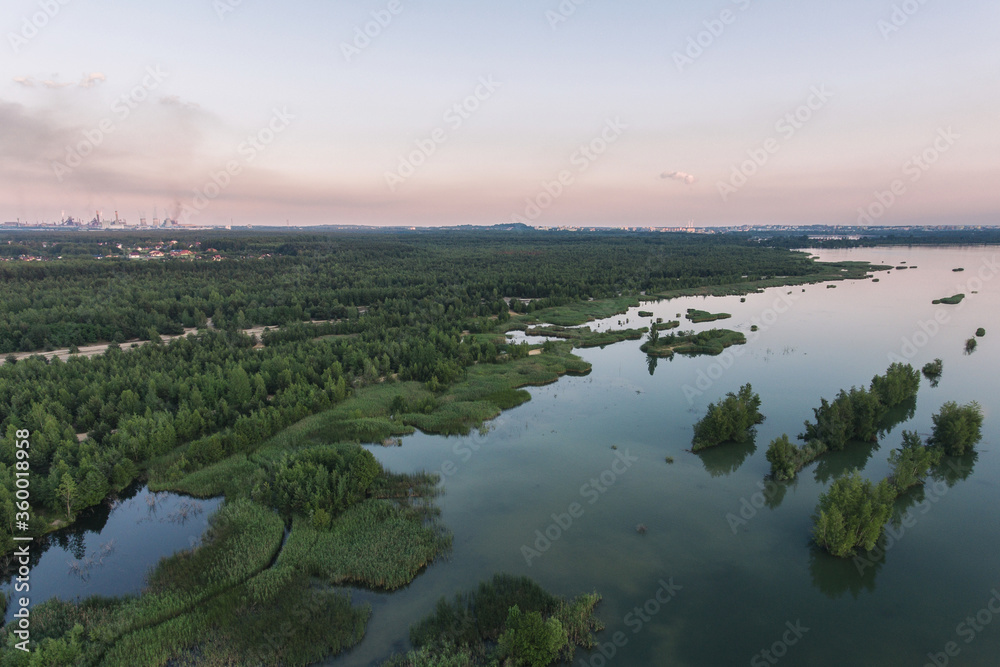 Beautiful lake with sand islands like atol. Lake pogoria in Dabrowa Gornicza Poland aerial drone view