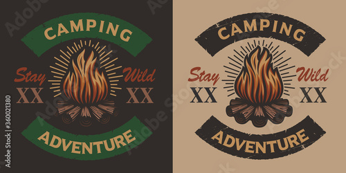 Colored vintage camping emblem with bonfire. Ideal for logos, shirt design, and many others uses
