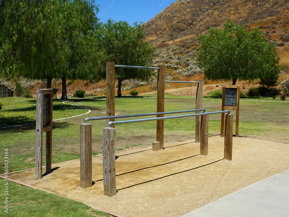 An Exercise fitness station in a public park.