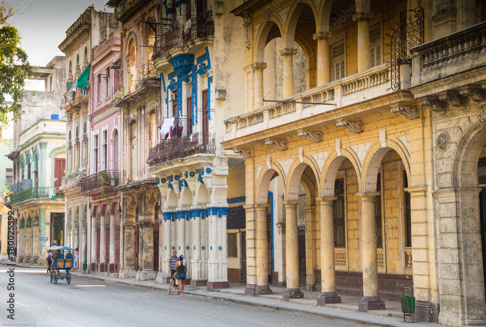 Quiet street  with multi-colored Colonial Architecture in Havana, Cuba