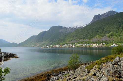 fjord and summer mountain landscape on the island of Senja, northern Norway