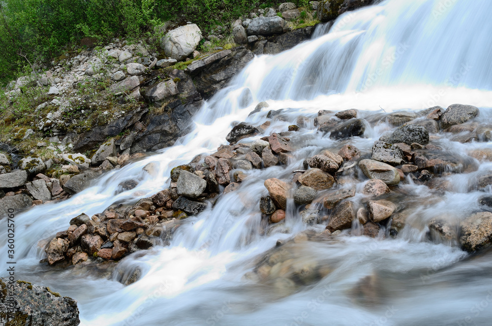 Fototapeta premium majestic mountain waterfall in northern norway