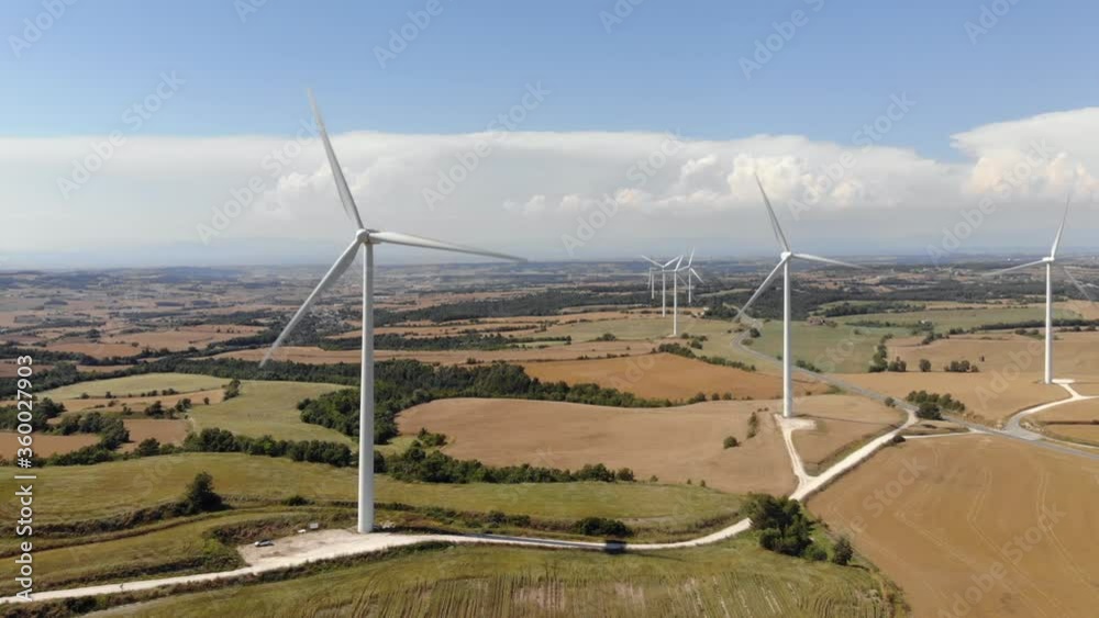 Large Wind Turbines in the countryside, a landscape plenty of fields (Spain) Large Wind Turbines in the countryside, a landscape plenty of fields (Spain)