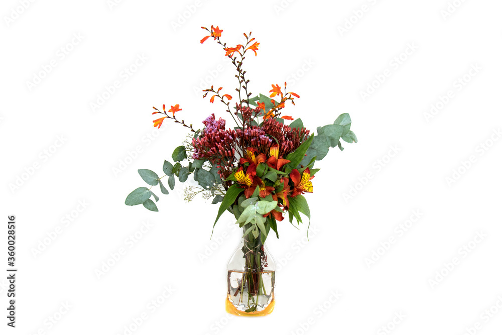 Amazing bouquet of flower over white background. Unusual stylish bouquet with orange, white and red flowers over white background. Amazing bouquet of flower over white background. Unusual stylish bouquet with orange, white and red flowers over white background.