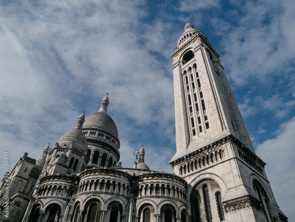 Bottom view of the Sacre Coeur Basilica in Paris against the sky.