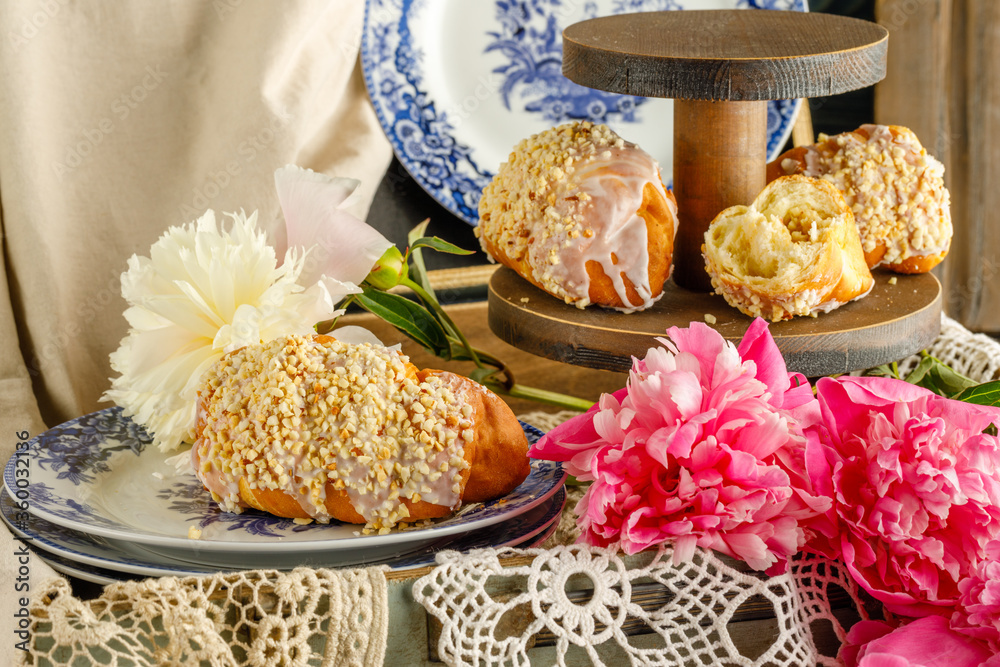 breakfast pastries served with flowers, retro style breakfast pastries served with flowers, retro style