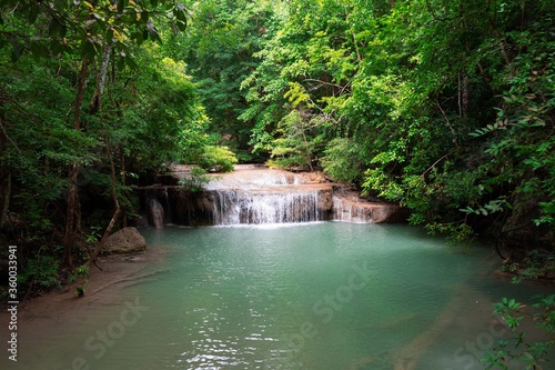 Fototapeta Naklejka Na Ścianę i Meble -  Waterfall with river in forest in Thailand