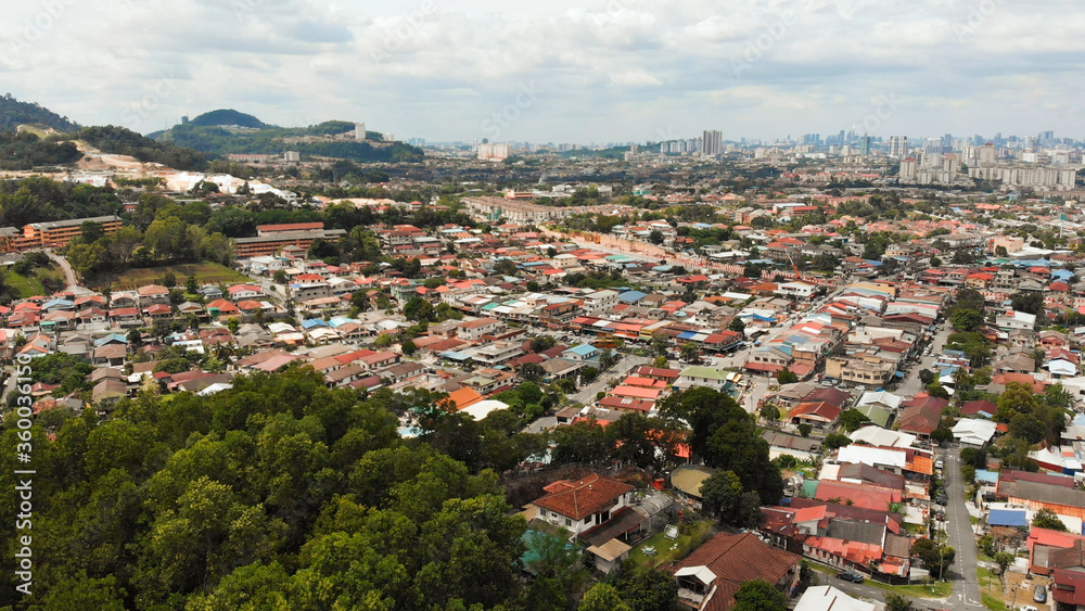 Panorama of all of Kuala Lumpur from the far outskirts of the city. Malaysia. Drone aerial footage.