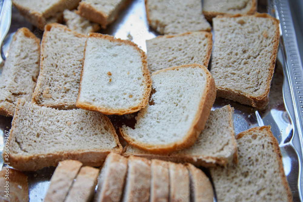 Homemade bread is dried on a tray. Homemade crackers. Homemade bread is dried on a tray. Homemade crackers.