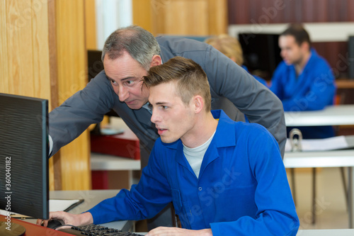 portrait of apprentice during computer leasson photo