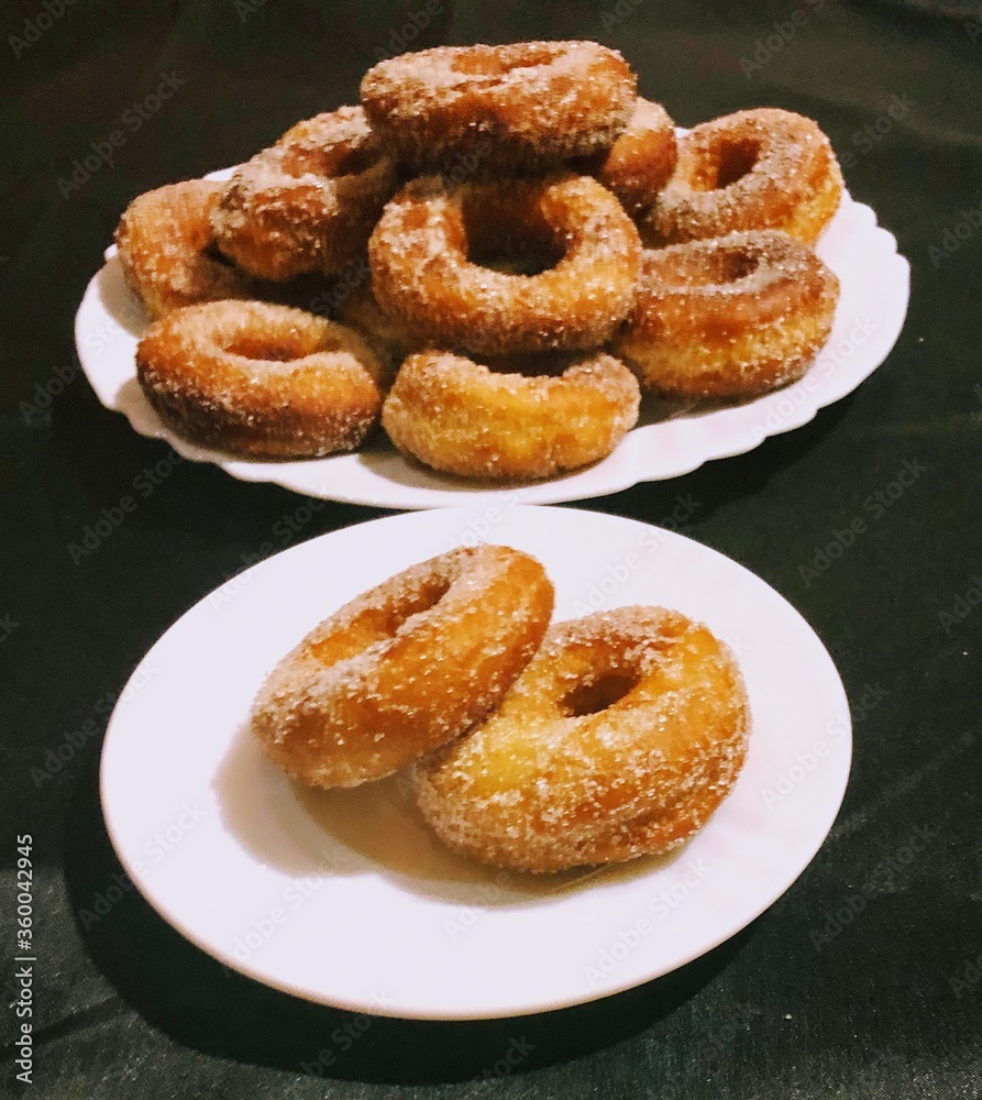 Beautiful sugary and homemade donuts Beautiful sugary and homemade donuts