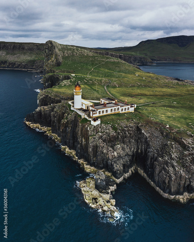Fotografiet Old historic Neist Point Lighthouse in Scotland UK