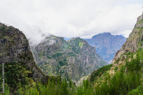 Mountain landscape. View of mountains and fog on the route Pico Areeiro - Pico Ruivo, Madeira