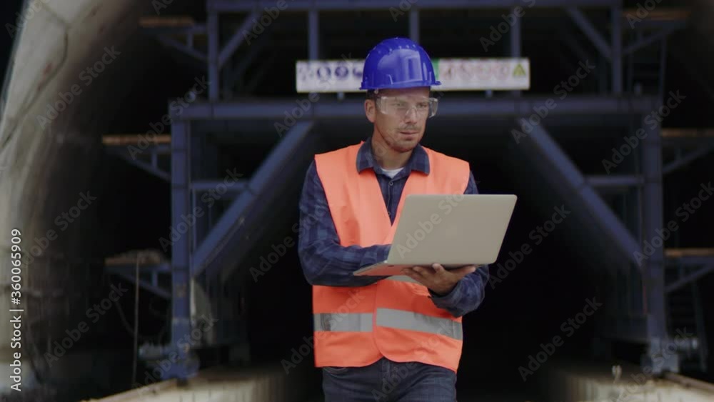 Construction engineer, architect or a supervisor wearing a protective