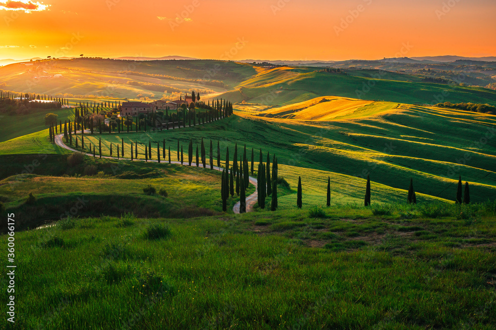 rural landscape with green fields and hills in tuscany at sunset rural landscape with green fields and hills in tuscany at sunset