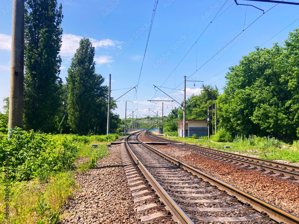 Railway tracks in countryside. Railway on sunny summer day. Railway tracks in countryside. Railway on sunny summer day.