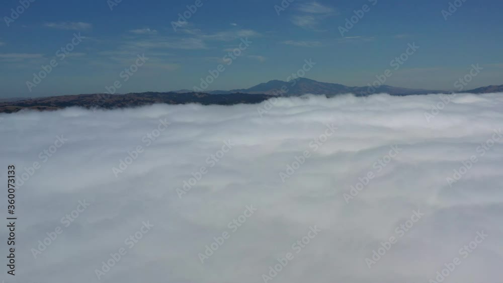 The marine layer has seeped into the East Bay in the San Francisco Bay region. This cloudy and sometimes foggy air mass develops over the ocean in the presence of a temperature inversion. The marine layer has seeped into the East Bay in the San Francisco Bay region. This cloudy and sometimes foggy air mass develops over the ocean in the presence of a temperature inversion.