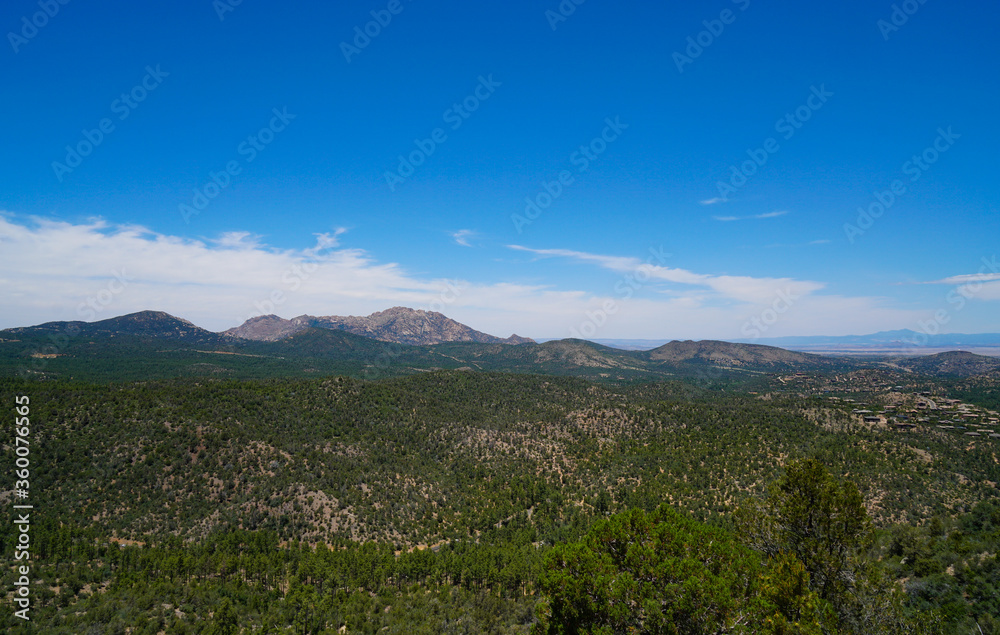 The views from the top of the trail on Prescott, Arizona's Thumb Butte. In the distance you can see Granite Mountain, and the San Francisco Peaks.