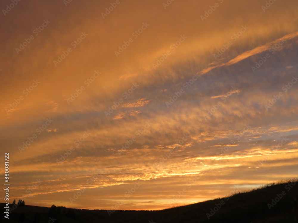 Red sky at sunset on a summer evening