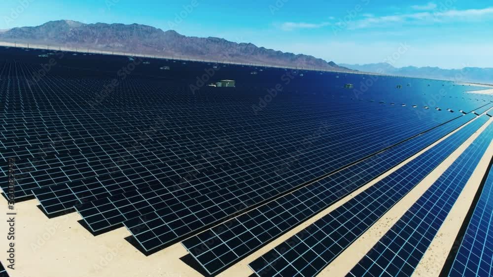 Aerial of solar panels field in California, renewable energy, mirrors in the middle of desert, the future of power generation industry