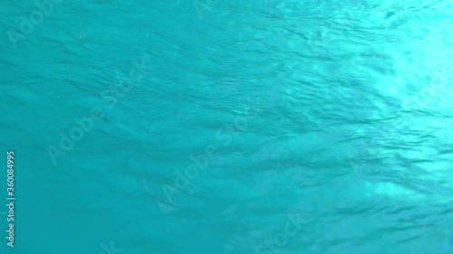 Wallpaper Mural Beautiful sparkling shiny texture of blurry blue water with sun reflected on surface of water Torontodigital.ca
