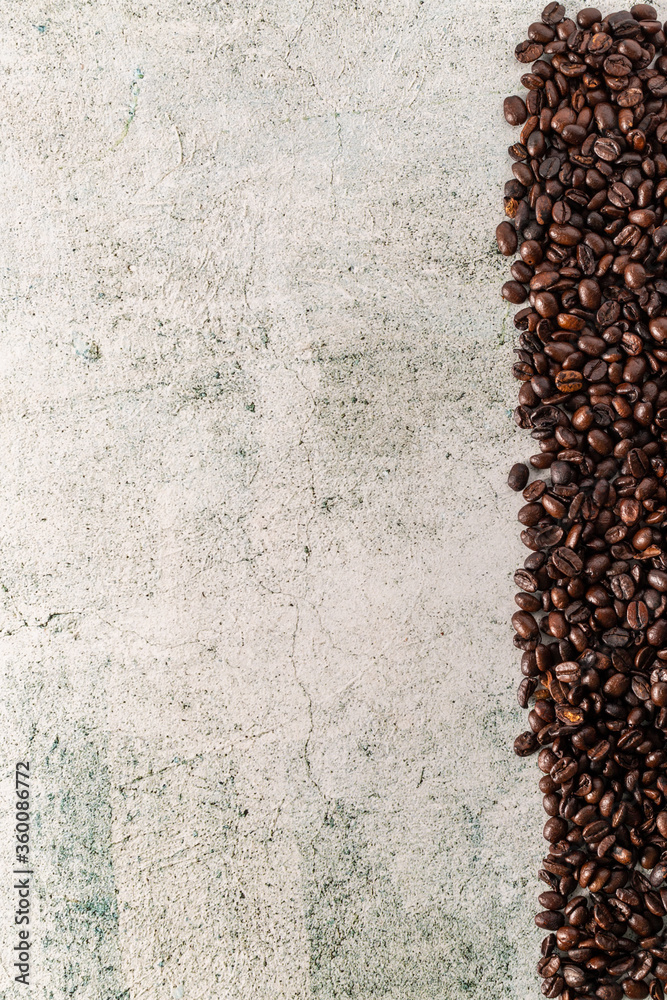 coffee beans on the ground with copy space coffee beans on the ground with copy space
