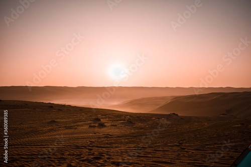 Beautiful sunrise over the Bidiyah Desert, Wahiba Sands in Oman. 
