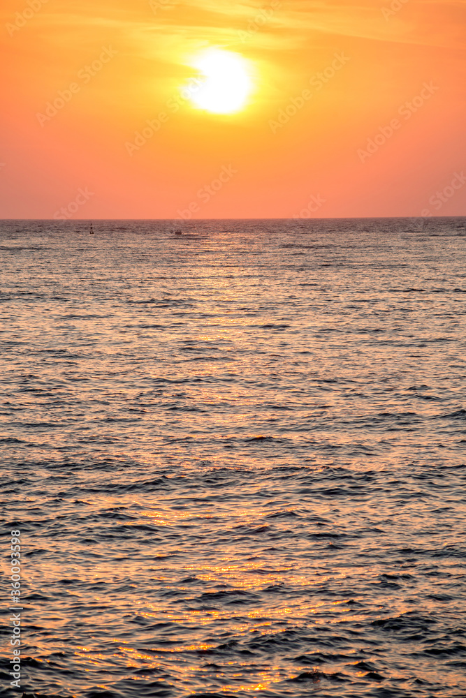 Sunset on the beach of the Azov Sea