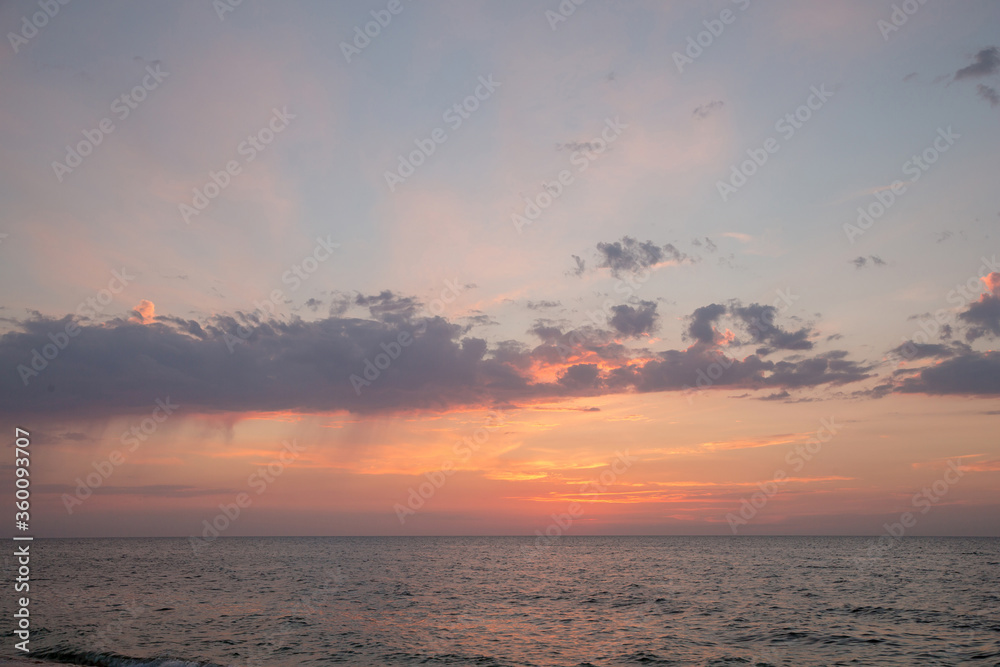 Sunset on the beach of the Azov Sea