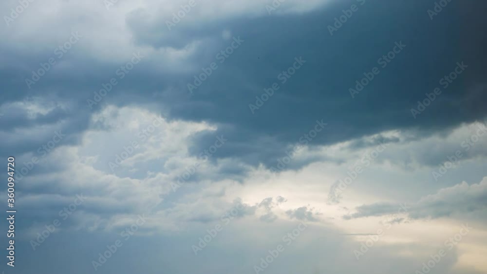 Dramatic Sky with dark stormy white clouds, time lapse shot. Dramatic Sky with dark stormy white clouds, time lapse shot.