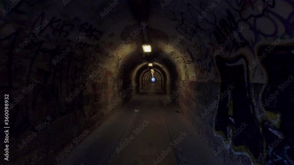 Passing through a graffiti painted tunnel. Budapest Hungary, Europe. 4K Passing through a graffiti painted tunnel. Budapest Hungary, Europe. 4K