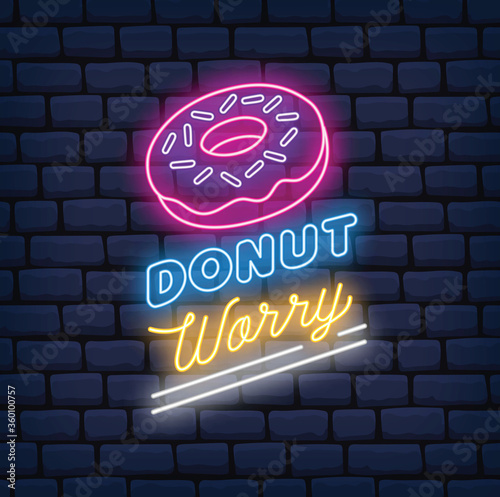 donut shop neon sign on brick background