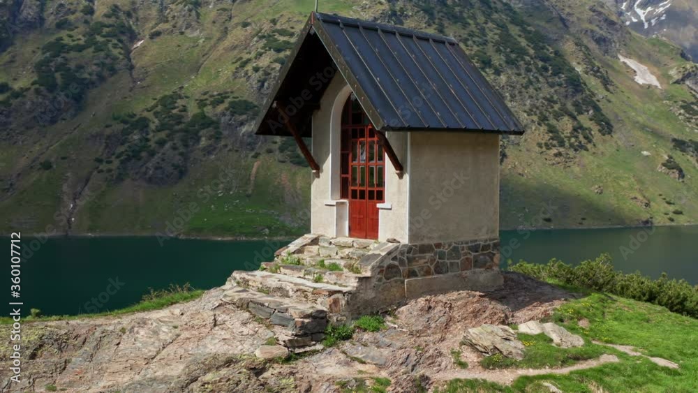 Circling Around Small Church at Barbellino Lake in the Italian Alps Circling Around Small Church at Barbellino Lake in the Italian Alps