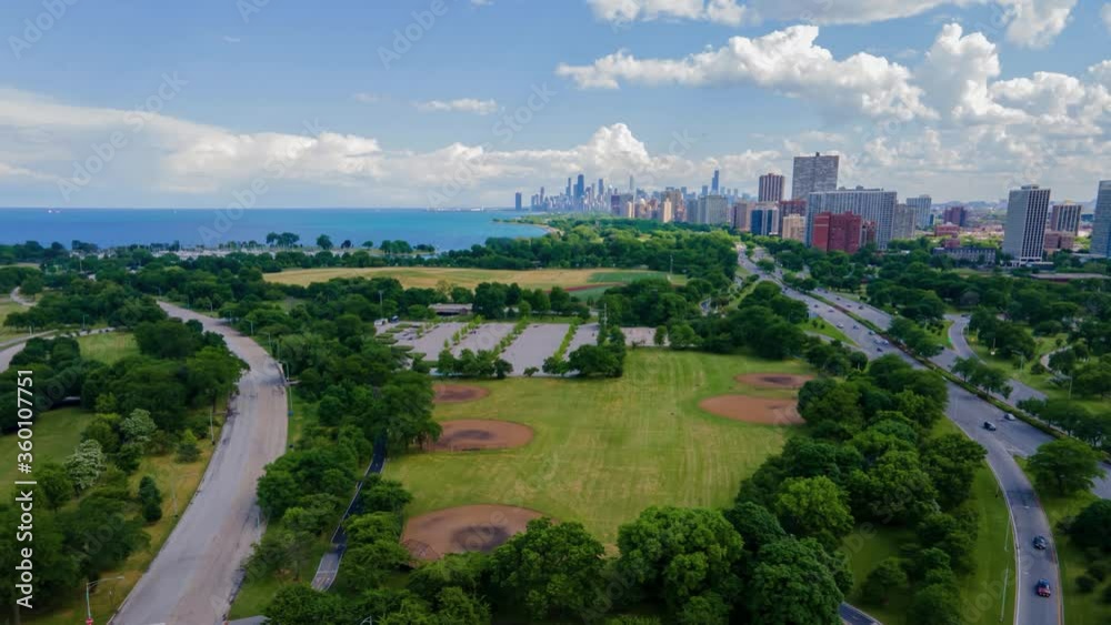 4k aerial drone hyper lapse of the Chicago downtown lake front area during mid afternoon.  the beautiful dramatic skyline shows the amazing building architecture that the city has.