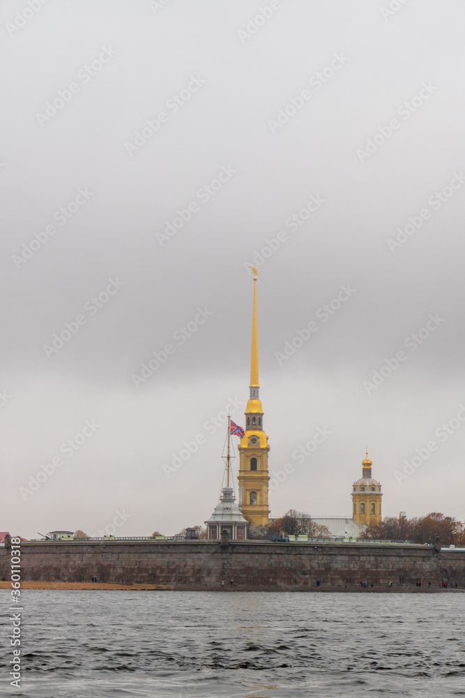 St. Petersburg. View from the Neva River to the Peter and Paul Fortress. It was founded in 1703. St. Petersburg fortress. St. Petersburg. View from the Neva River to the Peter and Paul Fortress. It was founded in 1703. St. Petersburg fortress.
