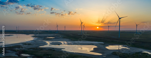 Wallpaper Mural Wind turbine at beautiful orange red sunset Torontodigital.ca