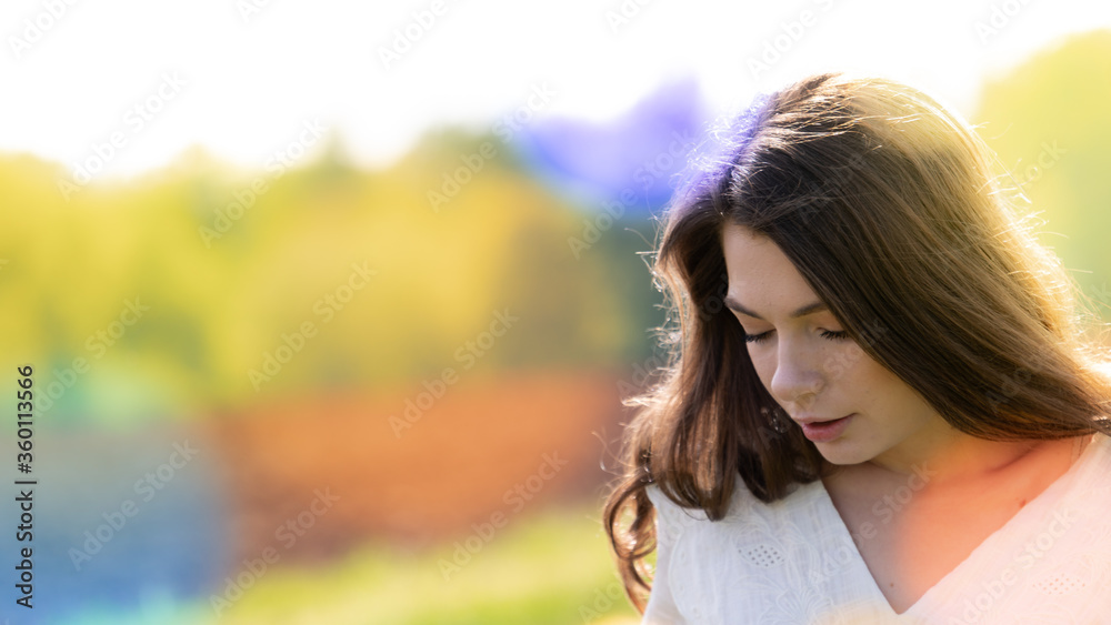 Outdoor portrait of Beautiful Young Attractive Woman Outdoor portrait of Beautiful Young Attractive Woman