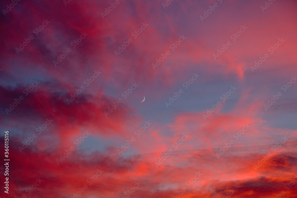 Amazing red sunset and moon