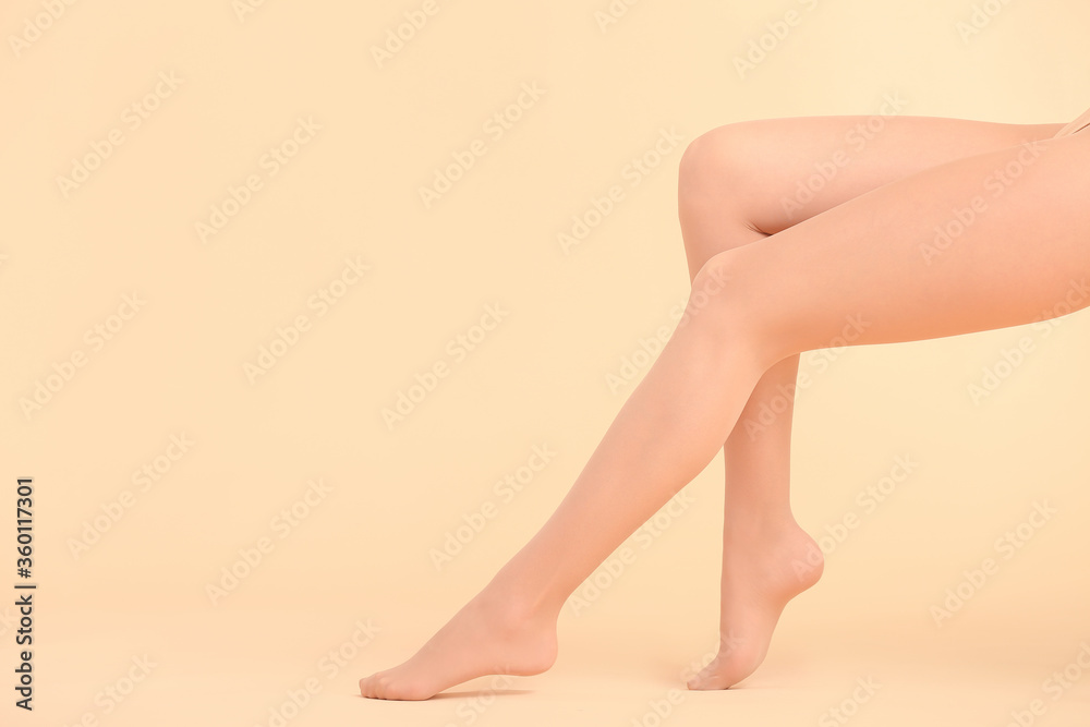 Beautiful young woman in tights on color background Beautiful young woman in tights on color background