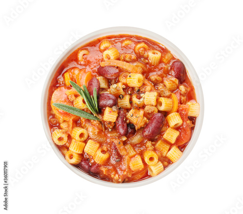 Bowl with tasty pasta and beans on white background