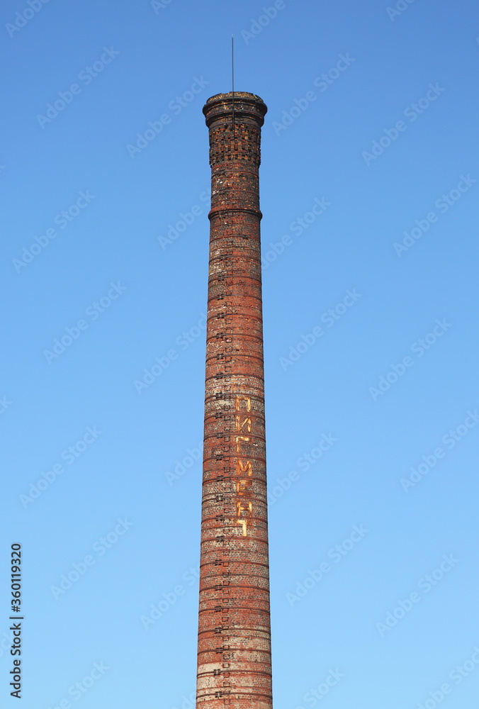 Factory chimney made of red brick