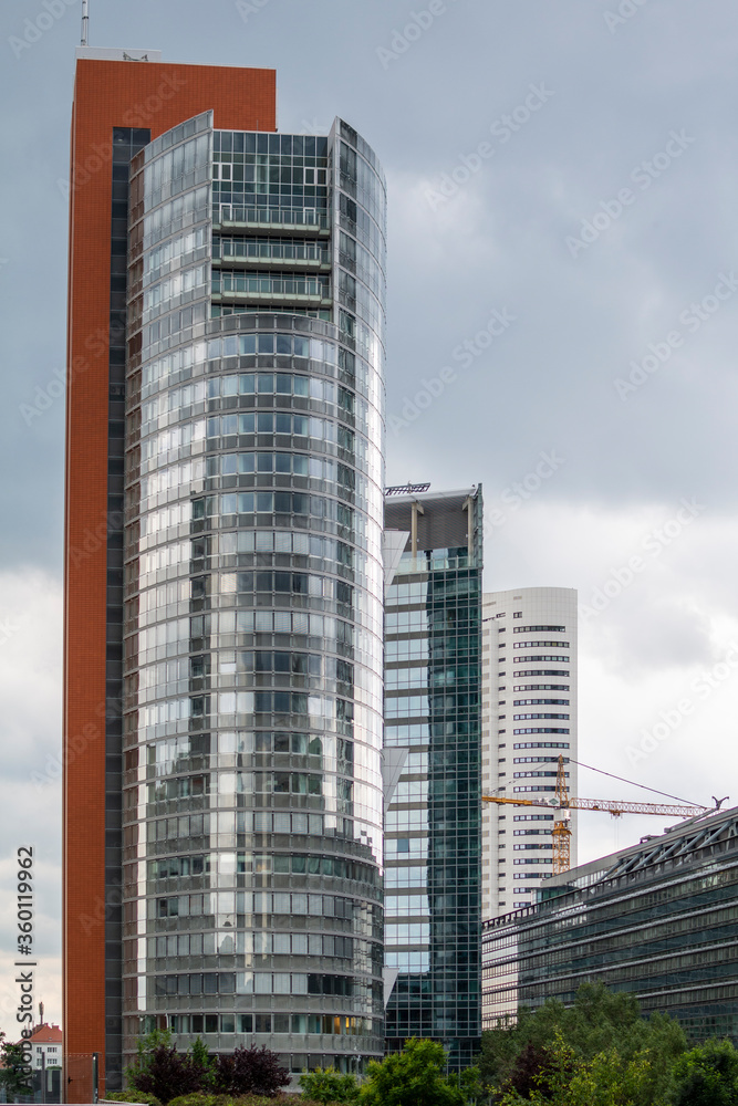 Fototapeta premium Business Skyscaper Vienna - Andromeda Tower. The Vienna International Center is a Complex with tall skyscrapers and high rise (corporate and residential) buildings next to the Danube River. 