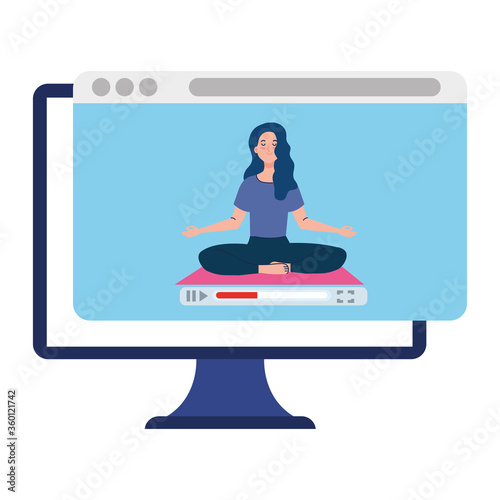online, yoga concept, woman practices yoga and meditation, watching a broadcast on a computer