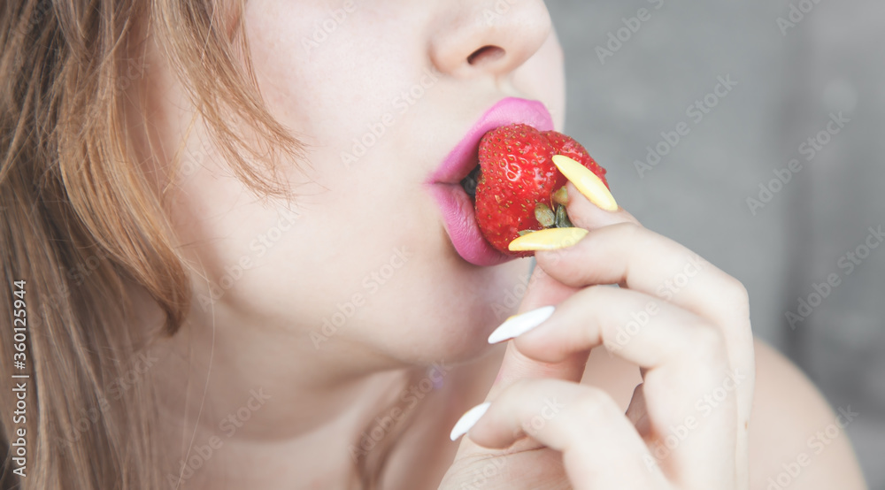Woman eating fresh strawberry. Health, Diet Woman eating fresh strawberry. Health, Diet