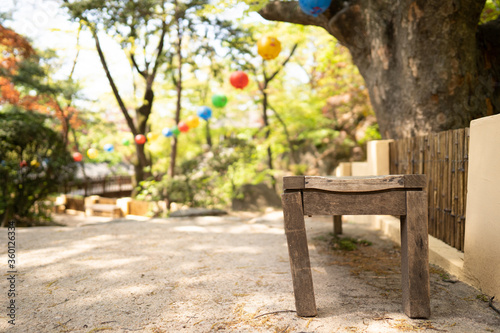 Wooden chair to rest in a Buddhist temple © Romyo Pictures