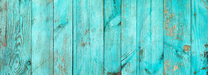 Weathered blue wooden background texture. Shabby wood teal or turquoise green painted. Vintage beach wood backdrop.