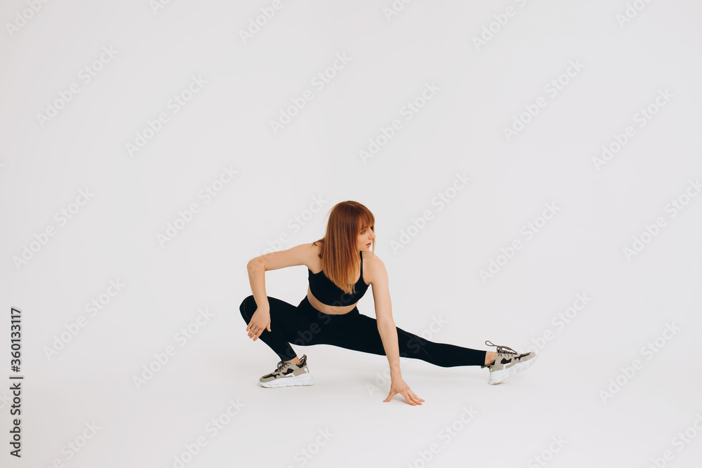 Young attractive girl practicing yoga isolated on white background. Concept of healthy life and natural balance between body and mental development. Full length